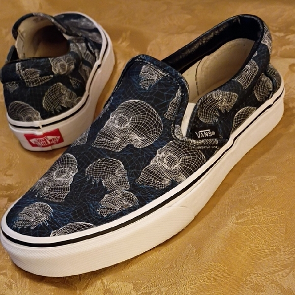 Vans Shoes - VANS RARE Black and White Skull Pattern Slip-Ons Women's 7.0 Men's 5.5